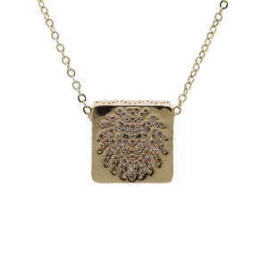 Golden square lion head necklace with zircon pavé mane and emerald green gemstone eyes