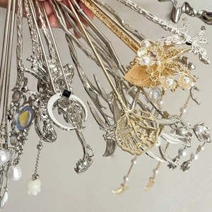 Detail of new Chinese style metal hairpins with tassels, pearls and zircon charms