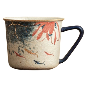 Hand-painted ceramic coffee mug featuring goldfish and lotus patterns with gold trim