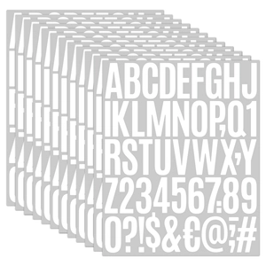 Stack of white uppercase letter and number stickers for journals and notebooks decor