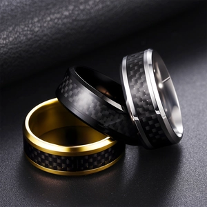Men's stainless steel rings in black, silver and gold with carbon fiber inlay textures