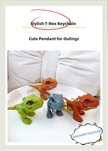Close-up of four colorful Tyrannosaurus Rex keychain toys with biting mouth design