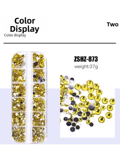 Detail of 12-grid box with yellow flatback resin rhinestones for acrylic nail art decoration