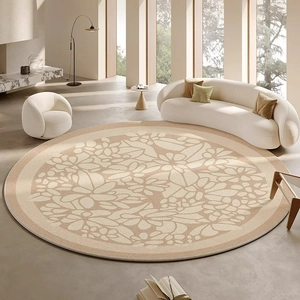 Modern beige round rug with vintage floral patterns for minimalist living room decor