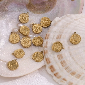 Vintage 14K gold plated stainless steel 12 zodiac pendants with embossed textures