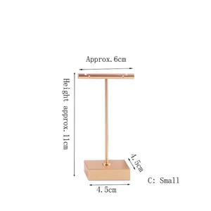 Golden T-bar metal earring stand jewelry display with small square base, 11cm height