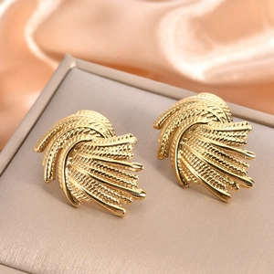 Elegant 18K gold plated feather earrings with metallic texture on luxury jewelry box