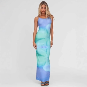 Close-up of abstract blue and purple watercolor print on a slim fit camisole maxi dress