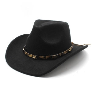 Detail of black wool felt cowboy hat featuring leopard print band with star rivets