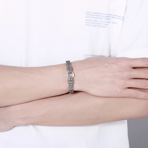 Vintage stainless steel double snake head bracelet for men with retro silver finish