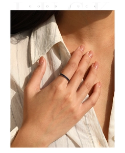 Close-up of S925 silver ring featuring elegant deep blue pave-set sapphires on finger