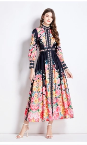 Detail of floral printed maxi dress with stand collar and button front design