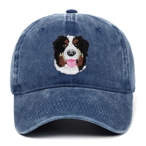 Close-up of Bernese Mountain Dog embroidery on vintage washed denim baseball cap