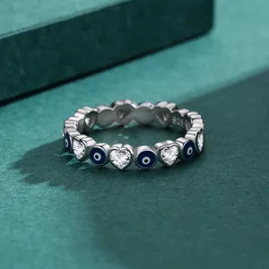 S925 sterling silver heart ring with blue evil eye zircons in a minimalist stackable style