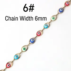Detailed view of 6mm golden evil eye jewelry chain with multi-colored resin beads