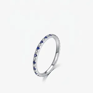 Elegant S925 sterling silver eternity ring with blue and clear pavé zircons