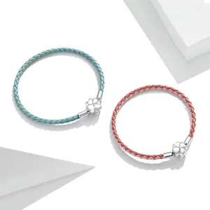 Braided leather bracelet with S925 sterling silver four-leaf clover clasp in pink and blue