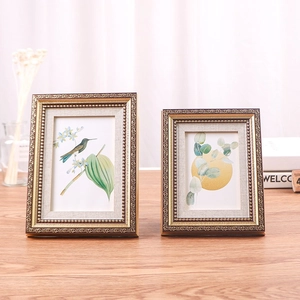 Classic vintage European style photo frame set with brown and gold embossed floral patterns