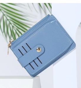 Detail view of a blue PU leather card holder featuring multiple slots and metal zipper