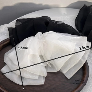 Detailed size view of the large layered chiffon bow hair clip measuring 26cm by 14cm