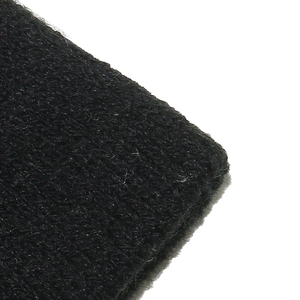 Close-up of the dense black knitted fabric texture and premium non-woven fiber weave
