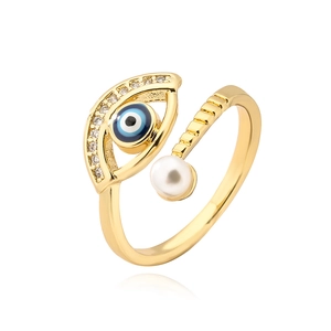 Gold plated evil eye open ring with zircon stones and a white pearl accent