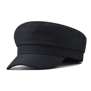 Side view of black cotton twill flat top navy cap showing structured brim and solid finish