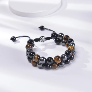 Detail of 10mm double-layer tiger eye and black onyx beaded bracelet with adjustable clasp