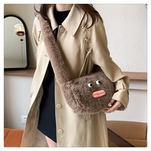 Brown fluffy plush crossbody bag with cartoon eyes and funny pink lips shown on model