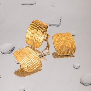 18K gold plated stainless steel jewelry set featuring wavy geometric texture design