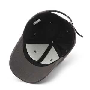 Internal structure of solid dark grey cotton baseball cap with 100% cotton label