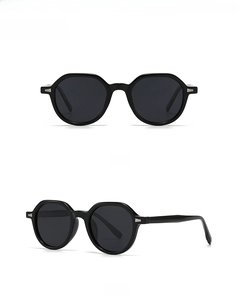 Front and 45-degree side views of black retro polarized sunglasses with glossy frames