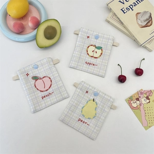 Detail of cute fruit embroidery canvas bags with snap buttons for small items