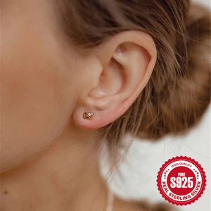 Elegant S925 sterling silver four-petal flower stud earring with diamond accents