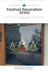 Detail of Christmas tree window stickers with gold outlines and red bows on glass