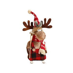 Charming red and brown plush Christmas reindeer doll on wooden skis ornament