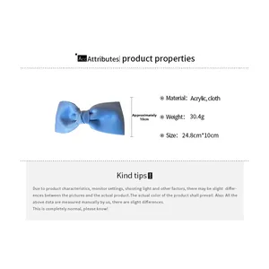 Detailed view of large blue satin bow hair clip with measurements 24.8cm by 10cm