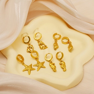 Detailed set of 18k gold plated starfish, dolphin, and seahorse drop earrings for summer
