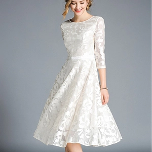 Elegant white lace dress with 3/4 sleeves and a flared A-line silhouette for women