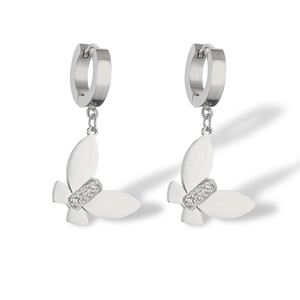 Detailed view of silver butterfly hoop earrings with sparkling rhinestones