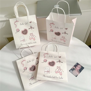 Ballet-themed white paper gift bags featuring vintage illustrations and pink ribbon handles