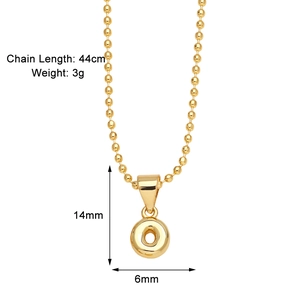 Macro shot of gold-plated initial pendant necklace with detailed size and weight specs