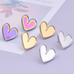 Detailed heart stud earrings in rainbow, gold, and silver with textured rope edges