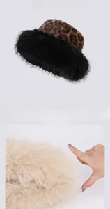 Detail of plush faux fur leopard print Mongolian hat showing thick thermal texture