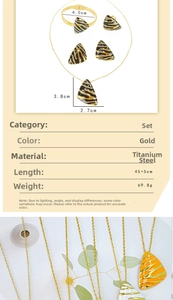 Detailed view of tiger print enamel jewelry set featuring necklace and spring bracelet