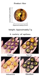 Macro detail of 25mm Yin Yang natural stone pendants in amethyst and tiger eye