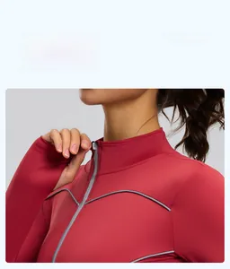 Close-up of stand collar and zip details on slim-fit yoga jacket for women