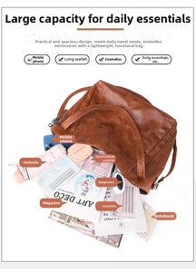 Macro shot of spacious brown leather tote bag interior showing large storage capacity