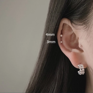 Detail of 925 silver stud earrings and bead chain hoop showing 3mm and 4mm sizes on ear