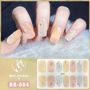 Detailed view of 5D gold star and moon nail stickers BB-004 on a nude gradient base